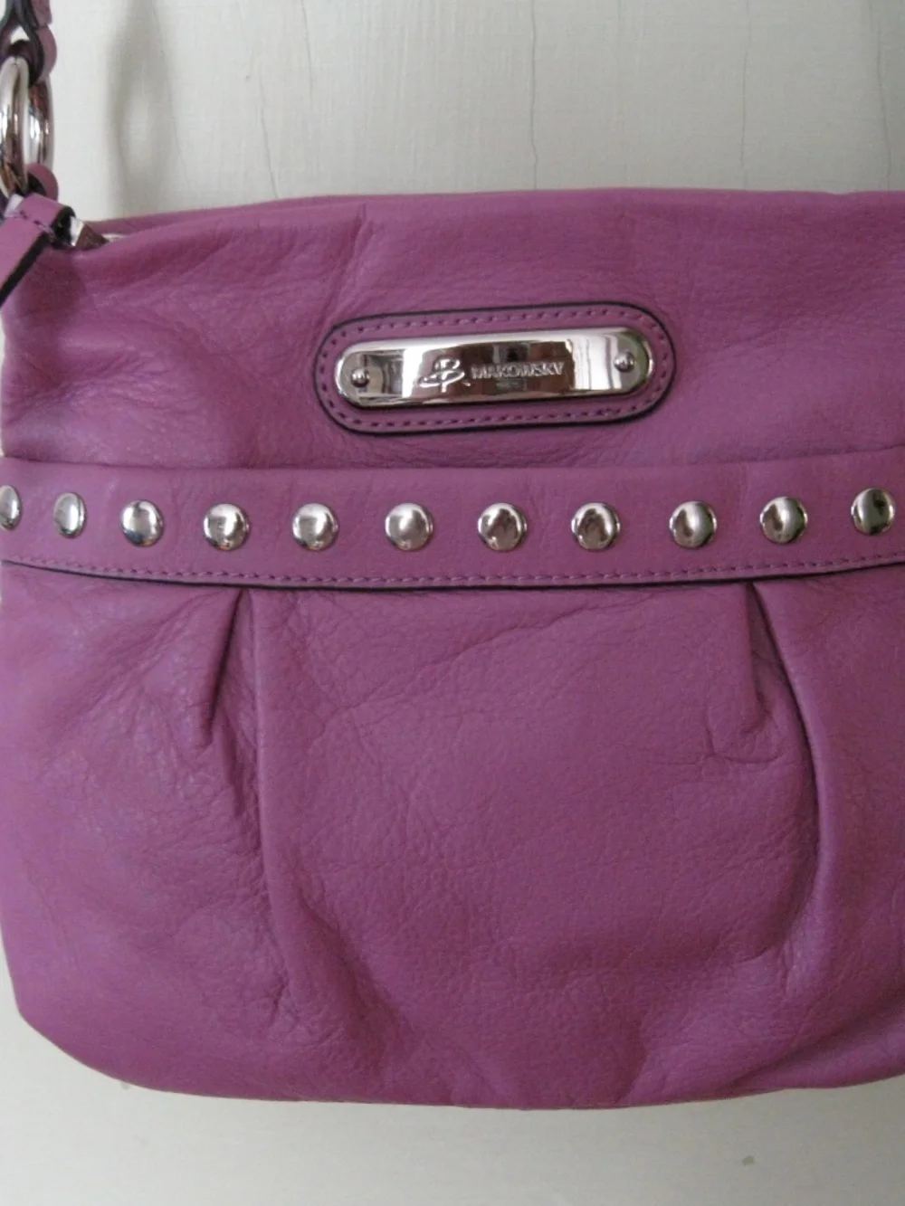 B. Makowsky purple leather crossbody handbag